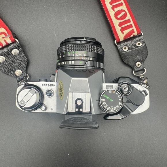 Canon AE-1 Program 35mm film SLR w/ Canon FD 50mm Lens & Accessories Untested - Picture 3 of 12